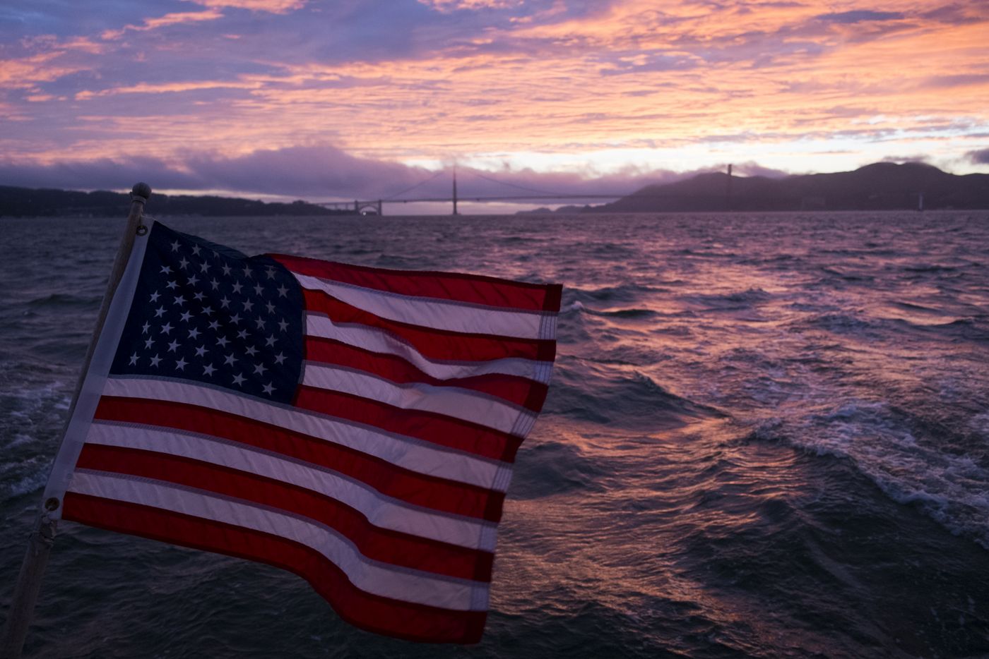 Cheesy flag picture with sunset